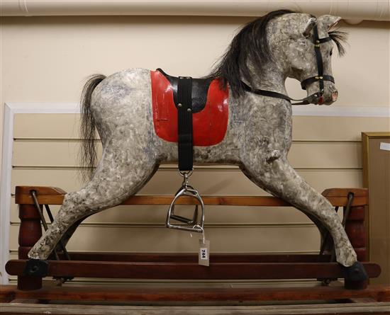 A painted dapple grey rocking horse W.135cm